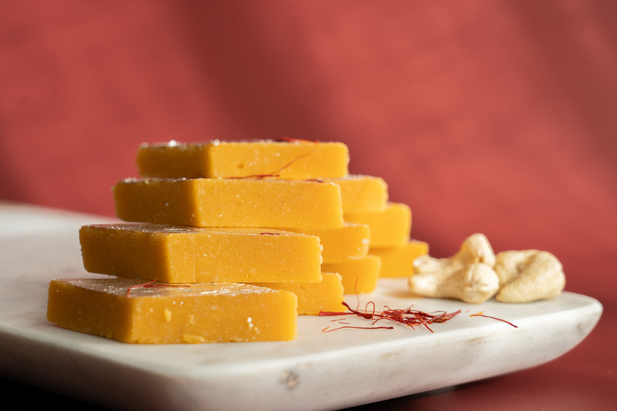 Gourmet artisanal Kesar Kaju Katli (Kesar Kaju Barfi) dessert bites from our Tarneit-based home kitchen, ideal for corporate gifting.